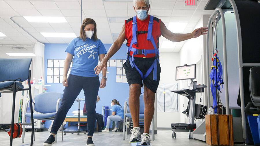 COVID survivor battles to regain old life.